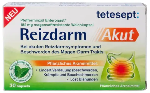 Verpackung von Reizdarm Akut mit Pfefferminzöl, magensaftresistenten Kapseln und Abbildung des Verdauungstrakts.